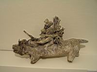 Sculpture vodou Fon, Benin, Homme sur un animal, bois, pigments, tissu, plumes, cauris, fers nois, poterie d'argile, corde, matieres veg. & sacrificielles (1)